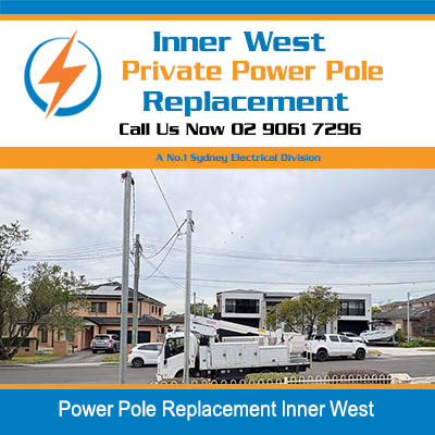 Installation of power pole with Utility trucks in Inner West
